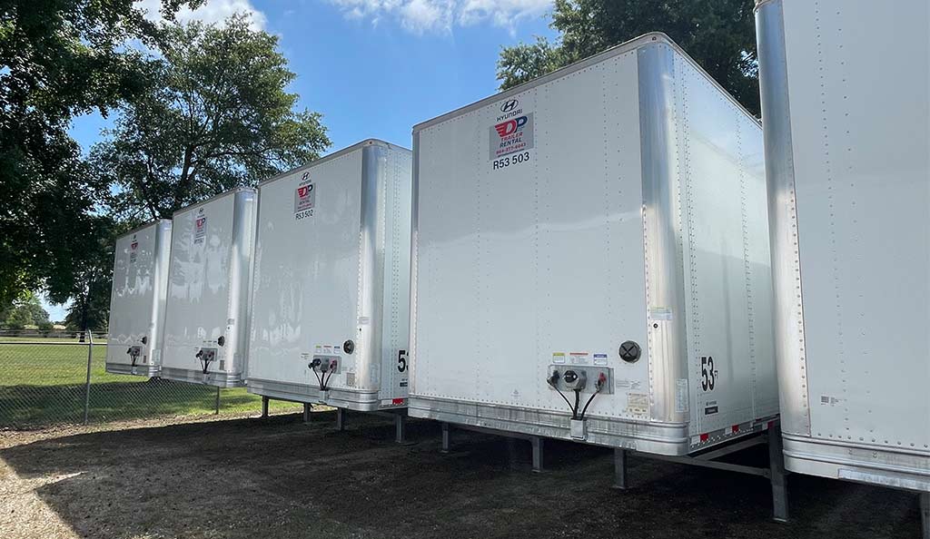 a lineup of DP semi-trailers.